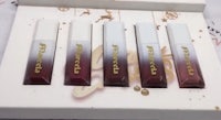 a set of lipsticks in a box